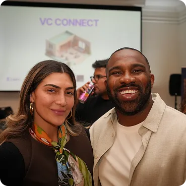 Two attendees at a Lazo VC Connect event